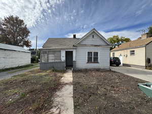 Bungalow-style home featuring a chimney