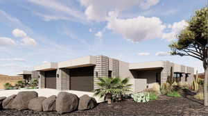 Modern home with stucco siding, a garage, and driveway