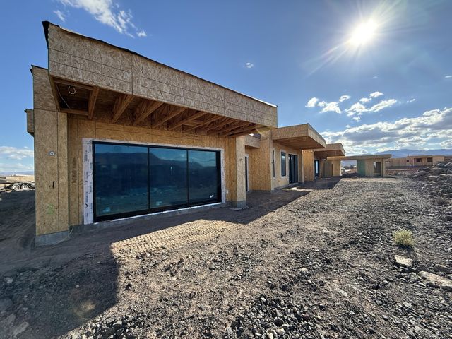 Rear view of property featuring a patio