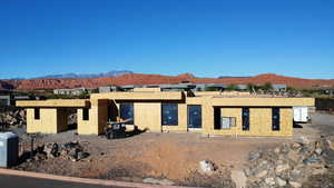 View of front of house featuring a mountain view