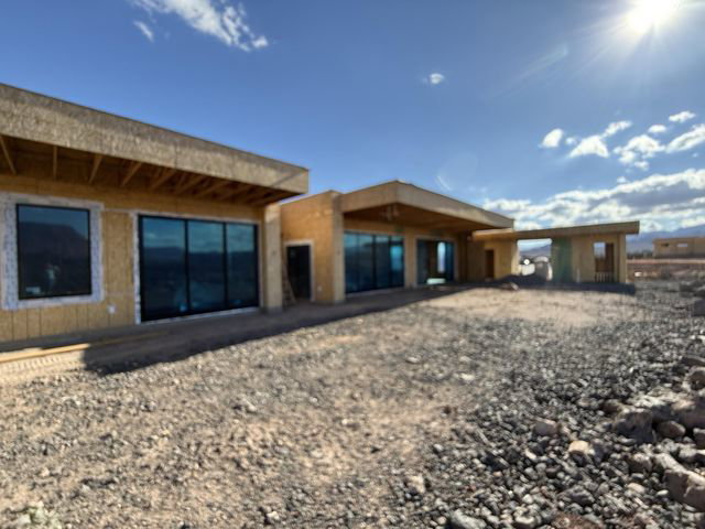 Rear view of house with a patio