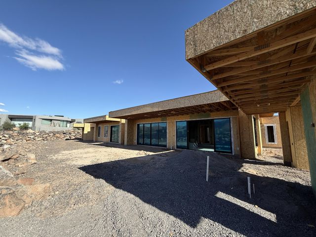 Rear view of property with a patio