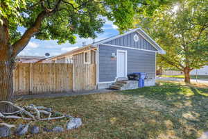 Back of property featuring board and batten siding