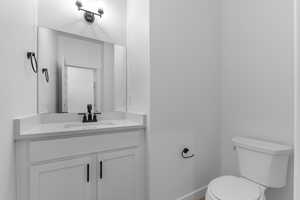 Bathroom with vanity and toilet