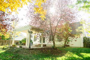 View of yard with a patio and a pergola