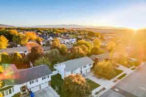 Aerial view of residential area with a mountain backdrop