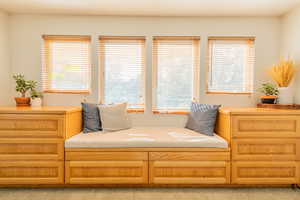 Beautiful custom drawers and sitting nook