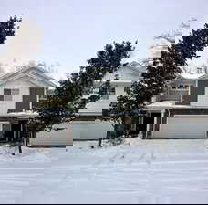 View of front of home featuring board and batten siding