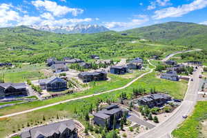 Aerial view of residential area with a mountainous background