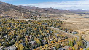 Aerial overview of property's location with mountains