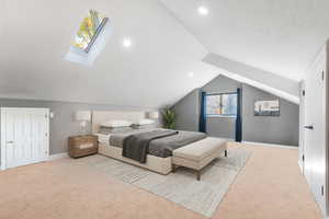 Bedroom 3, Virtually staged, featuring light colored carpet, a skylight, lofted ceiling, and recessed lighting