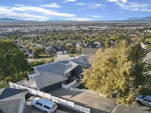 Aerial view of residential area featuring mountains