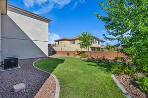 View of fenced backyard