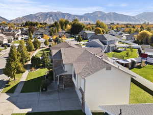Aerial view of residential area featuring mountains