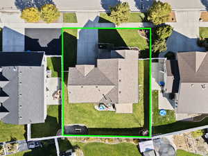 Aerial perspective of suburban area with property boundaries highlighted