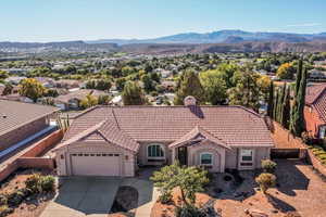 Aerial view of residential area with a mountain backdrop