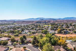 Aerial view of residential area with a mountain backdrop