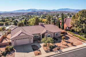 View of subject property with a mountainous background