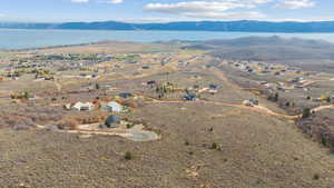 View of property location featuring a view of the mountains and lake.