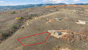 Aerial view of property lines with a mountainous background