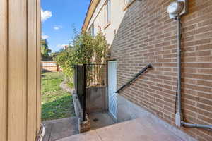 Gate featuring a patio