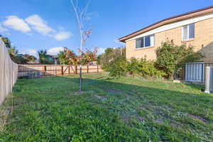 View of fenced backyard
