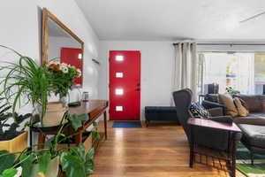 Living area featuring light wood finished floors