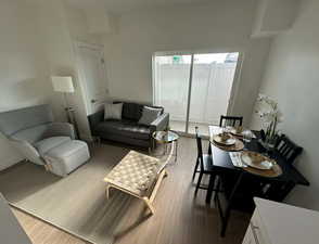 Living area featuring wood finished floors