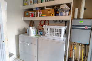 Washroom with washing machine and dryer