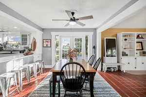 Dining area featuring healthy amount of natural light and a ceiling fan