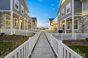 Surrounding community featuring covered porch and a residential view