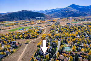 Aerial view of residential area with a mountainous background