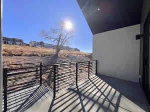 Balcony featuring a residential view