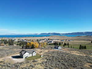 View of mountain backdrop with a nearby body of water