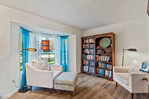 Living area featuring light wood-style floors