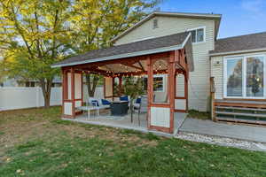 View of patio featuring a gazebo and outdoor lounge area