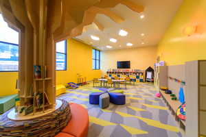 Kids game & play room featuring recessed lighting and wallpapered walls