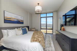 Bedroom with light wood-style floors