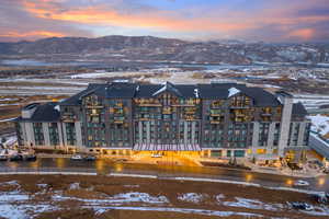 Aerial view at dusk of a water and mountain view