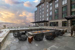 View of patio featuring a mountain view and a fire pit
