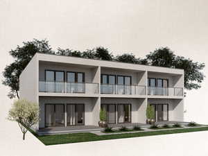 Back of property featuring a balcony