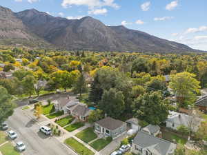 Aerial perspective of suburban area with a mountain backdrop