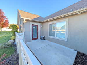 View of patio / terrace with washing machine and clothes dryer