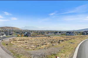 Mountain view featuring nearby suburban area