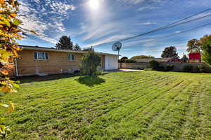 View of yard with a patio area