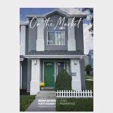 View of front facade with stucco siding