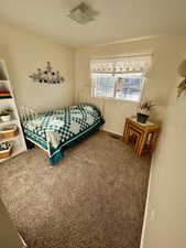 Upstairs carpeted bedroom