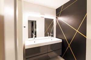 Bathroom featuring double vanity