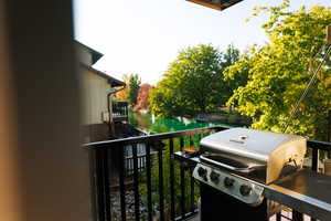 Balcony with a grill and a water view
