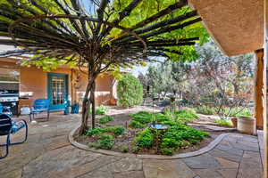 View of patio / terrace featuring a grill and a pergola